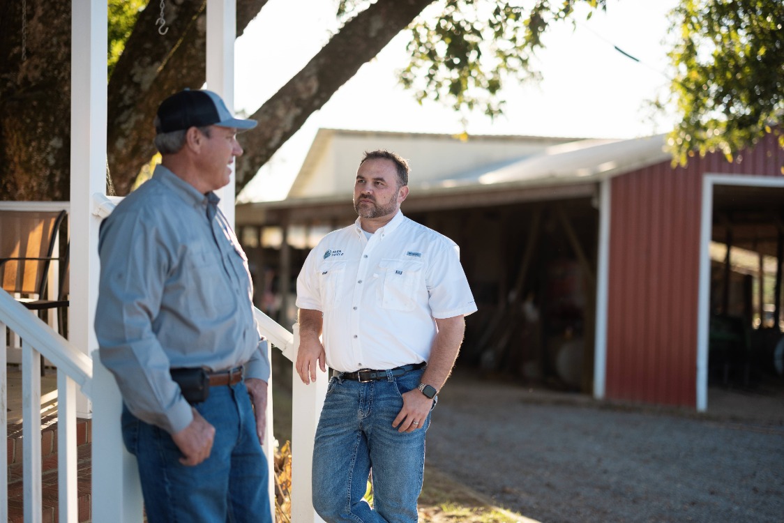 Nathan Kinnaman talking with a client